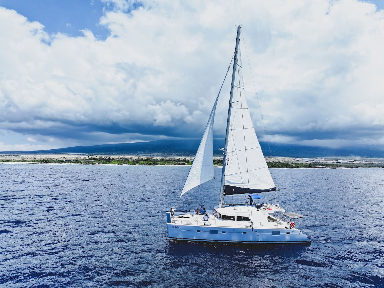 Featured image for “51′ Lagoon 500 Catamaran w/Honokohau 65’ Commercial Slip, Corporation, Commercial Use & Mooring Permits”